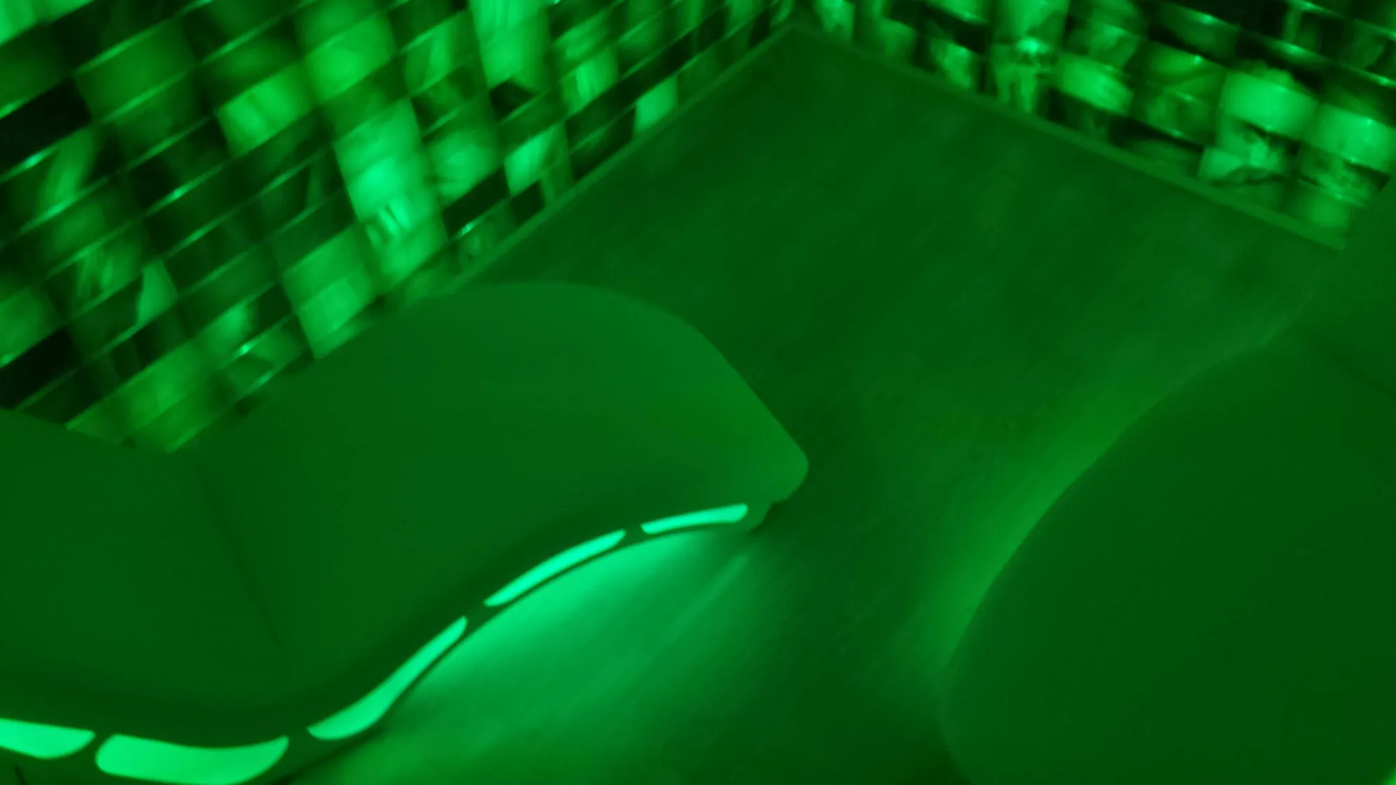 The salt room lit green.