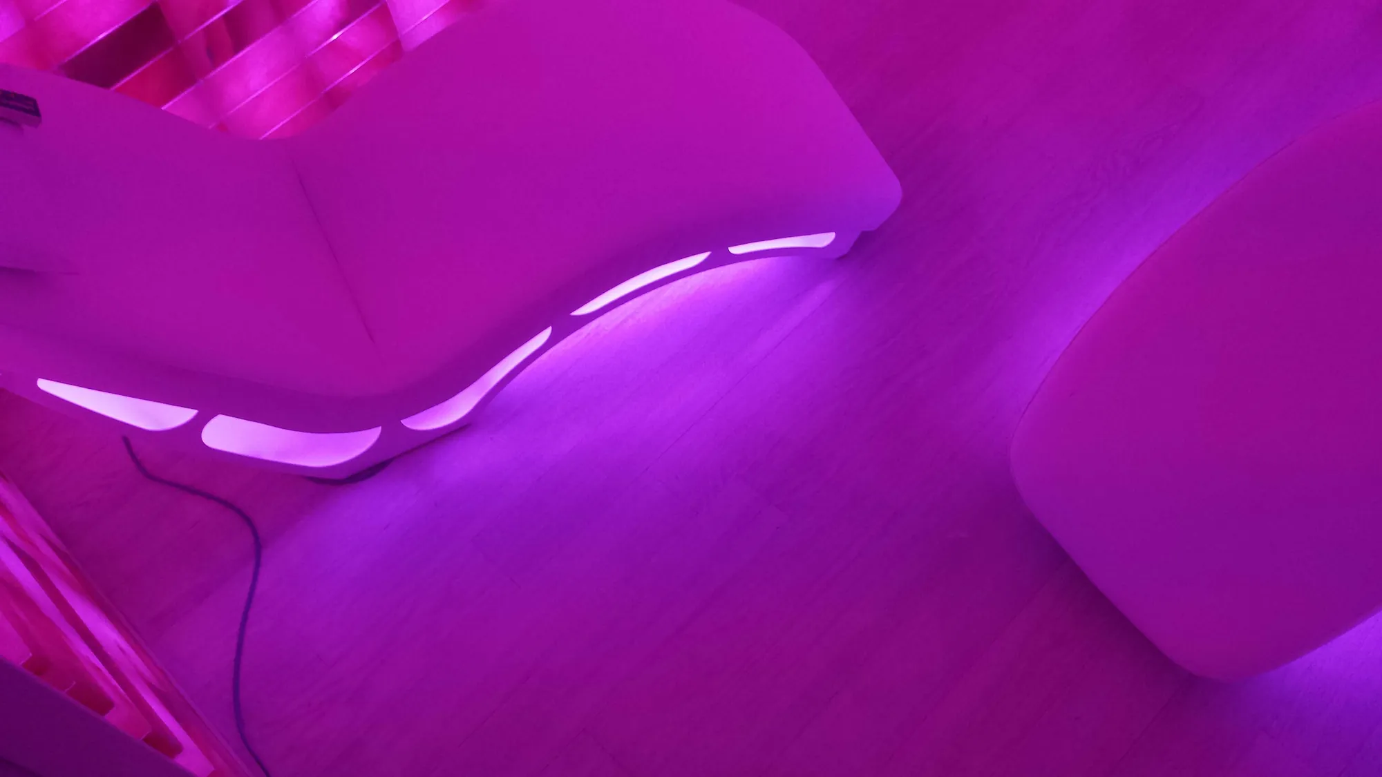 The salt room lit magenta.