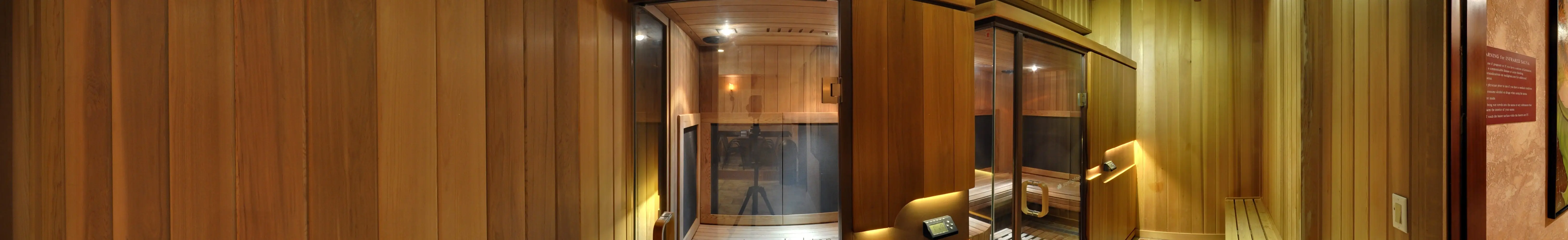 Two glass-fronted cedar infrared cabins in BRC's cedar-panelled infrared room.