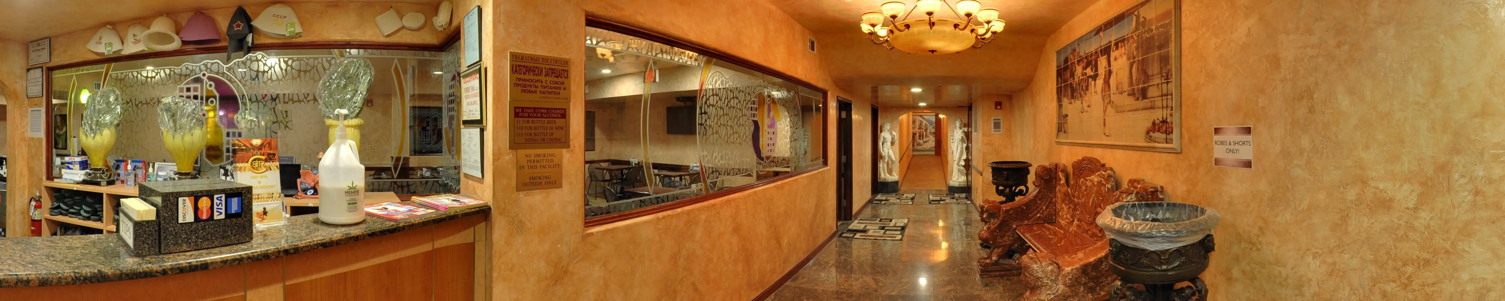 BRC's reception: the key board behind the front desk, the mural and the marble corridor beyond.